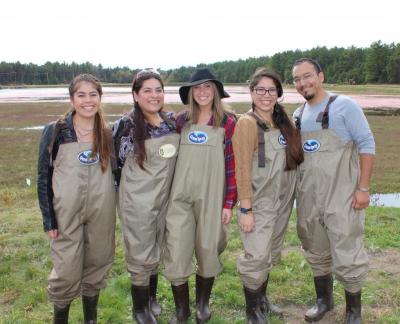 From left: Martha Durex, Martha Ribbero, Jessica Aspinwall, Esther Durex and Marcos Morales donned Ocean Spray waders before stepping into a flooded bog. BY MATTHEW BERNAT