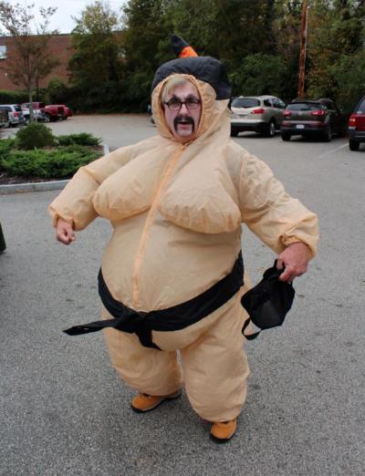 Rick England, owner of Legacy Insurance, gets into the spirit with this larger-than-life sumo wrestler costume. BY MATTHEW BERNAT