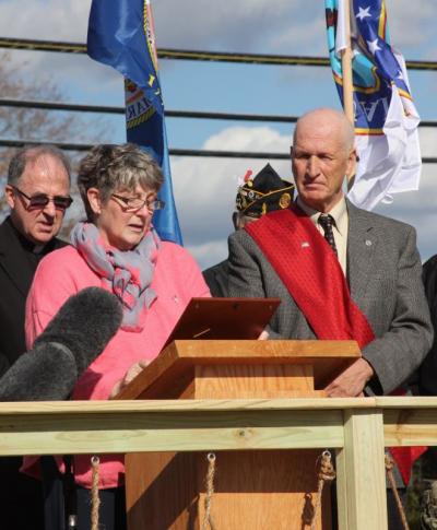 Selectmen Chair Judith Whiteside presents parade Grand Marshal Dan Minkle with a Veterans Day proclamation. BY MATTHEW BERNAT