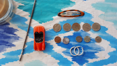 Smith and others regularly post their finds on the group's Facebook page. Because of the numerous cars he finds on his hunt, Smith jokes that he owns 'Bernie Glock's Used Car Lot' and celebrates new additions. He often gives away the toy cars he finds to children while treasure hunting on the beach. COURTESY TOM SMITH