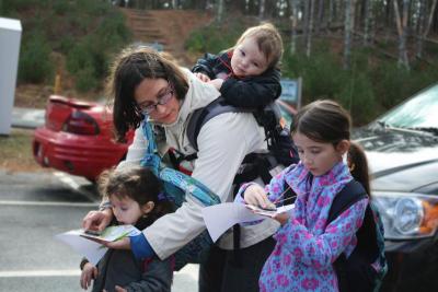 Heidi Lebro brings her children - Felicity, 8, Addy, 4, and George Lebro Malley - on the map and compass challenge. BY ZARRIN TASNIM AHMED