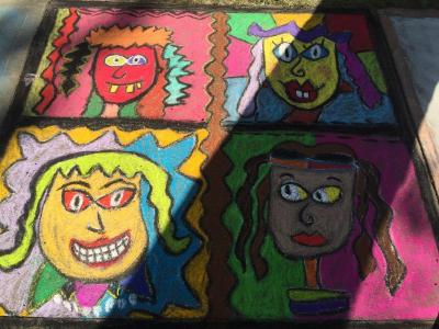 More than 100 sidewalk squares were filled with colorful creations such as this on Sunday. BY MATTHEW BERNAT