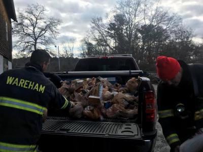 Wareham Firefighters Local 2810 hosted a Food Drive in from of Shaw’s Supermarket on Sunday to benefit the Turning Point Holiday Outreach Program. Photo courtesy: Turning Point of Wareham