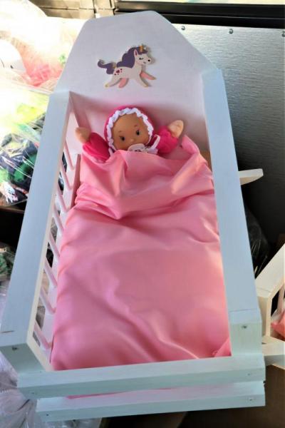 Handmade wooden doll crib was just one of many amazing toys donated during the drive. Photo by: Nadya Korytnikova