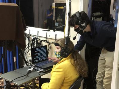 Eighth grader Isabella Rose and sophomore Indiana Troupe work through a teleprompter malfunction minutes before the Dec. 16 show goes live.