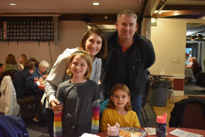 Jessi Merrick with her husband, Matt, and daughters, Kemper, 8, and Lincoln, 7, at the “Taste of Our Town” event.