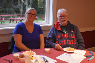 Donna Sparrow and her uncle, John Smolinsky, having buffalo mac and cheese at the “Taste of Our Towns” event.
