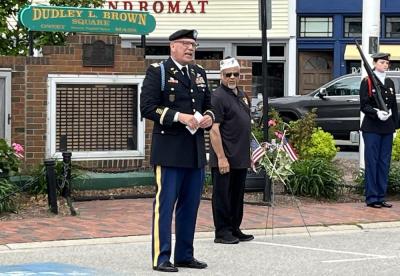 Matthew Stanton gives a speech in front of the Dudley L. Brown Square Memorial in Onset. Photo by Nora Bicki