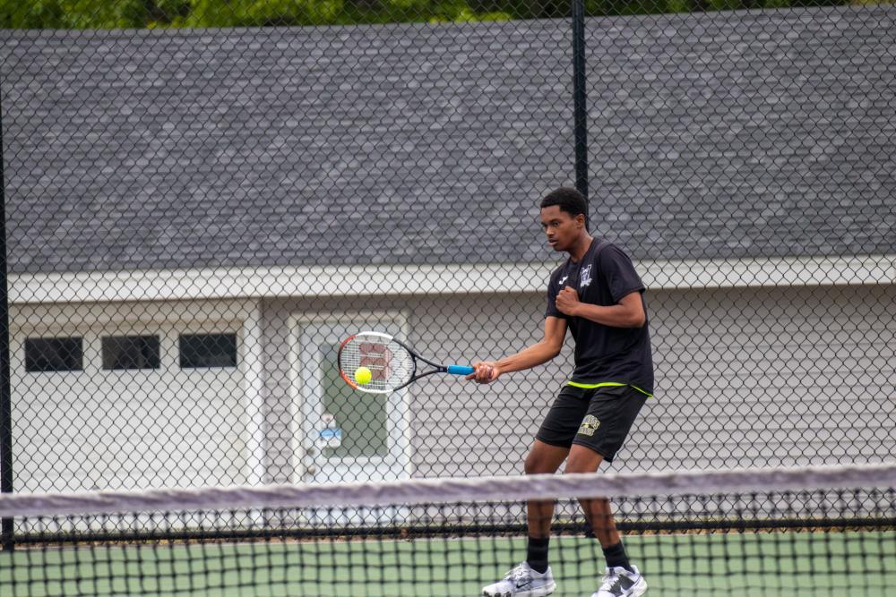 KJ Bonner connects on a return.