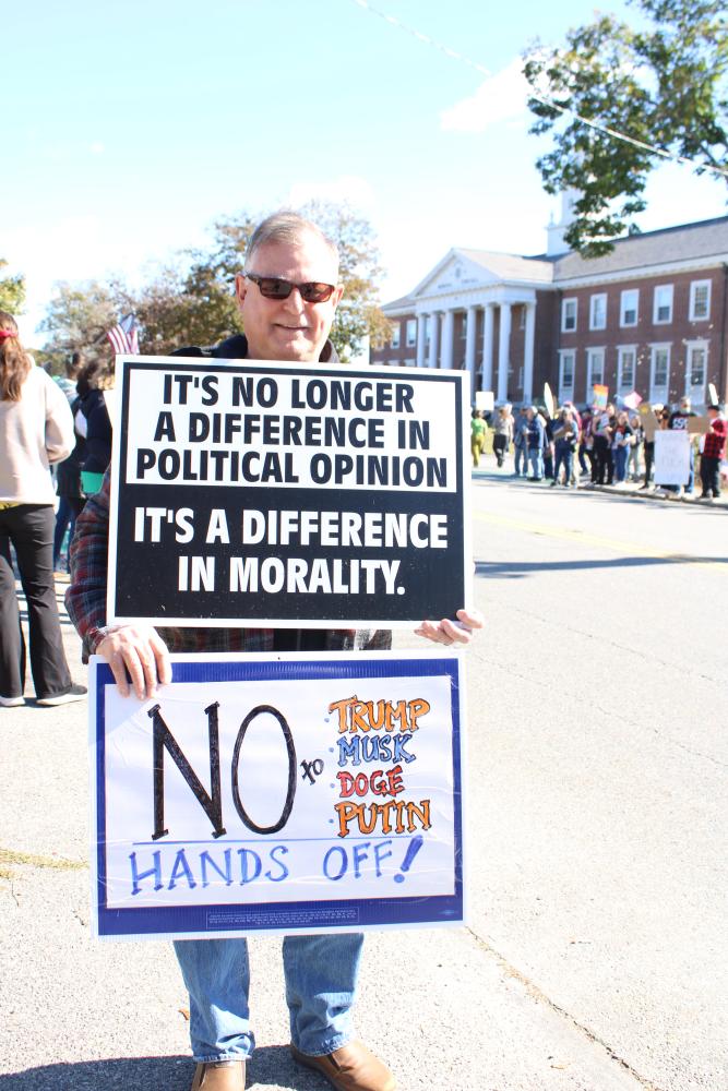 Many like David carried two signs. Many like David carried two signs.