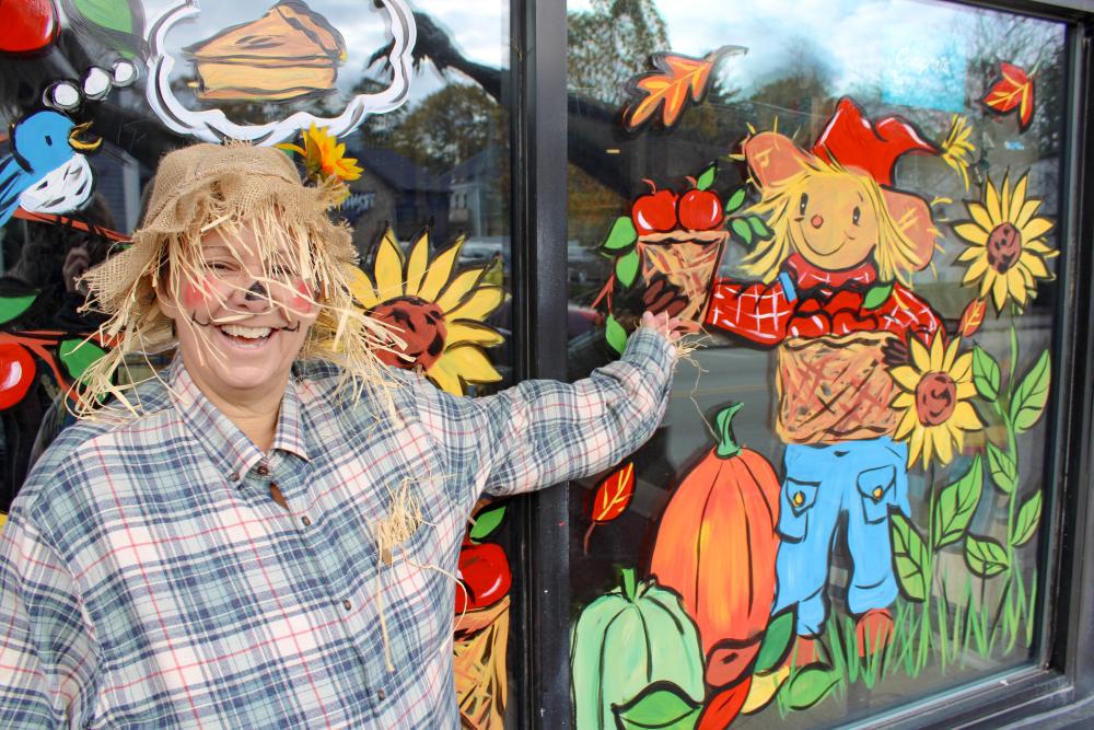 Leslie Durling outside of the cafe on Halloween. Photo by Brandy Muz