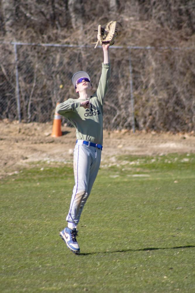 Brenden Quinn goes for the catch. Photos by Brandy Muz