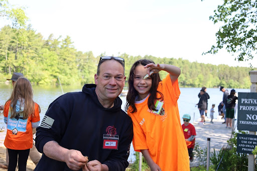 John Murphy, left, and Lily Alexander, right with a fish. Photos by Nick Mossman