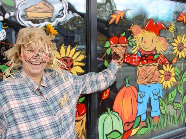 Leslie Durling outside of the cafe on Halloween. Photo by Brandy Muz
