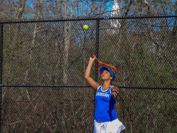  Julianna Frye serves during a home game against Old Rochester on May 1. Photos by Grace Roche