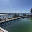  In the coastal enclave of Dolphin's Cove, 22 Spindrift Lane offers a truly rare waterfront setting defined by unobstructed views and a private stretch of beach - an increasingly scarce combination on Cape Cod. 