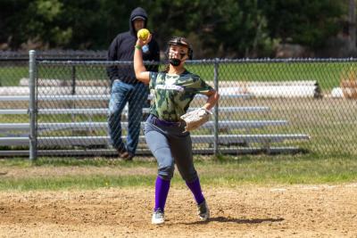 Cheylah Troupe makes a throw across the diamond. Photos by Bobby Grady