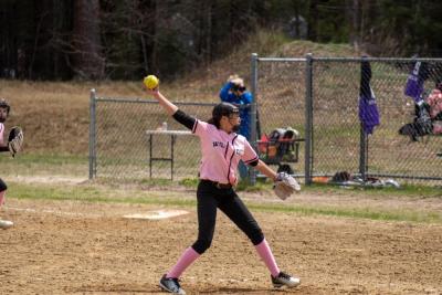 Nevayah Harraden-Jameau mid wind up before delivering a pitch.