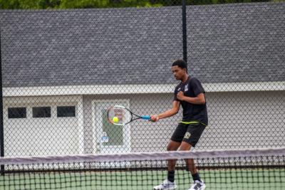 KJ Bonner connects on a return.
