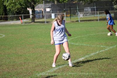Brooke Roy dribbles during practice. 