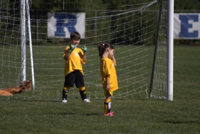 Goalie shows his rock and roll hands through his gloves