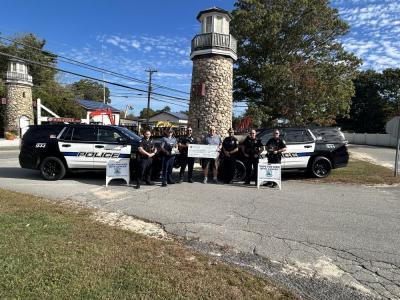 Left to right: Officer William Roush, Mass State Trooper Corey Caraher (Tournament Winner), Officer Lorenzo Grosso, CFKWC Board Member Tom Reed, Chief Walter Correia, Officer Blaise Lalli, Officer Calib LaRue. Photo source: Wareham Police Department