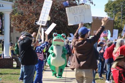 The inflatable frog popped around to different spots of the protest.