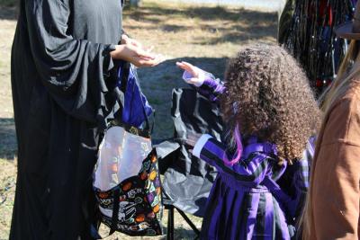 Xyla Wade hands out candy.