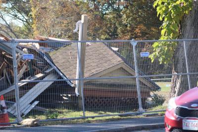 Part of the roof remained after the structure had toppled. Photo by Brandy Muz