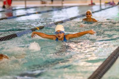 Eight-year-old Isa Duran of Wareham practices the butterfly. none