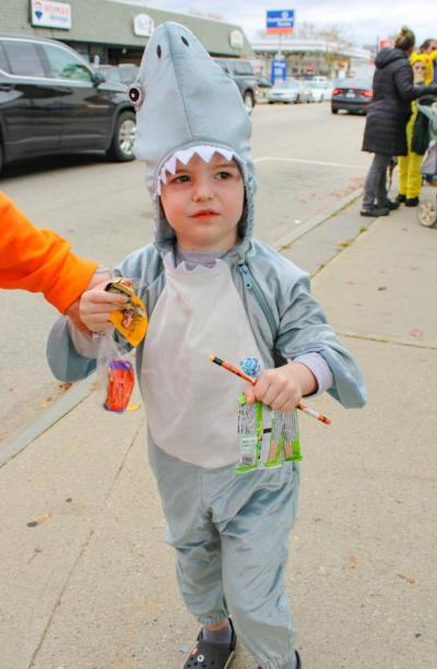 Jaws comes to Main Street as William Gropman dresses as a shark.