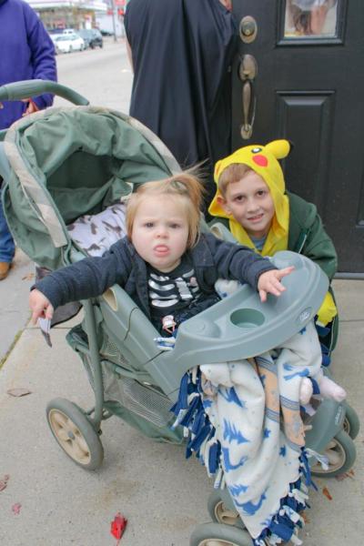 Worlds collide as skeleton Alora Fortes and Pikachu Noah Brown pose for a photo. 