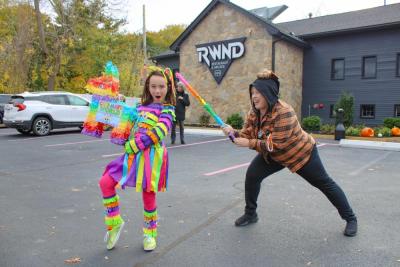 Cade Mae Pearson's costume is a smash hit as her mom tries to get some candy.