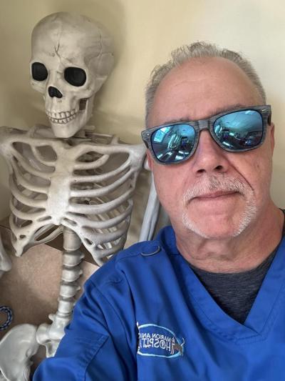 Wood while on the job at Marion Animal Hospital. Photo source: Carlston Wood