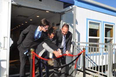 Church leadership cuts the ribbon before the first indoor service. Photos source: Grace Lighthouse Church