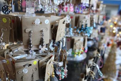 Handmade jewelry at one table. 