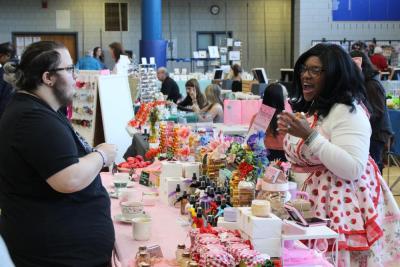 The Bunniary table laughs with customers. Photos by Brandy Muz