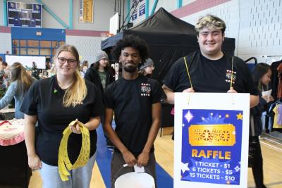Students walk around selling raffle tickets.