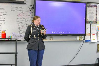 Speaking on her time with the JROTC Ava talks to her peers.