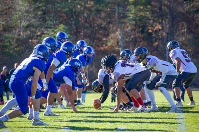 The Upper Cape Tech and Cape Tech teams face off on the field. 