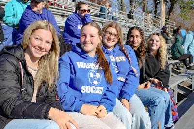 A group of Wareham fans in the stands donned in blue and white.
