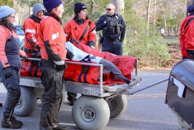 The dolphins were loaded onto a soft mat and transported by a team from  International Fund for Animal Welfare. Photos by Brandy Muz