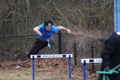Ryland Potter clears the hurdle. Photos by Brandy Muz