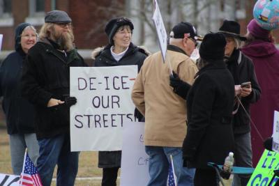 Many showed with creative signs playing on the word "ice."