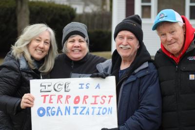Maria and Ed in the center gathered with friends.