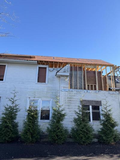 The exterior of the home as renovations began. Photo source: Bill Bachant