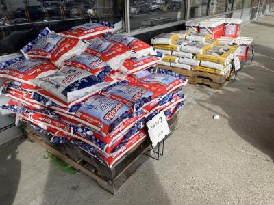 Bags of salt outside of the Aubuchon Ace Hardware. 