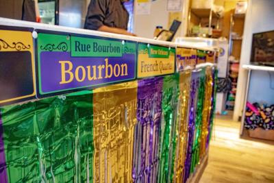 New Orleans decorations at the front counter.