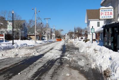 Snow removal on Main Street began in the early morning Thursday, Jan. 29. Photo by Bobby Grady