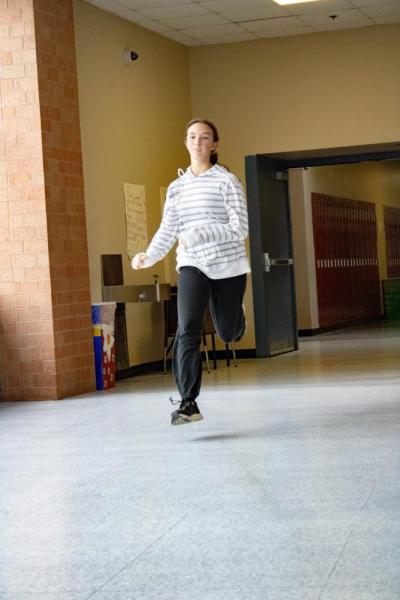 Ava Ostiguy dashes down the halls.